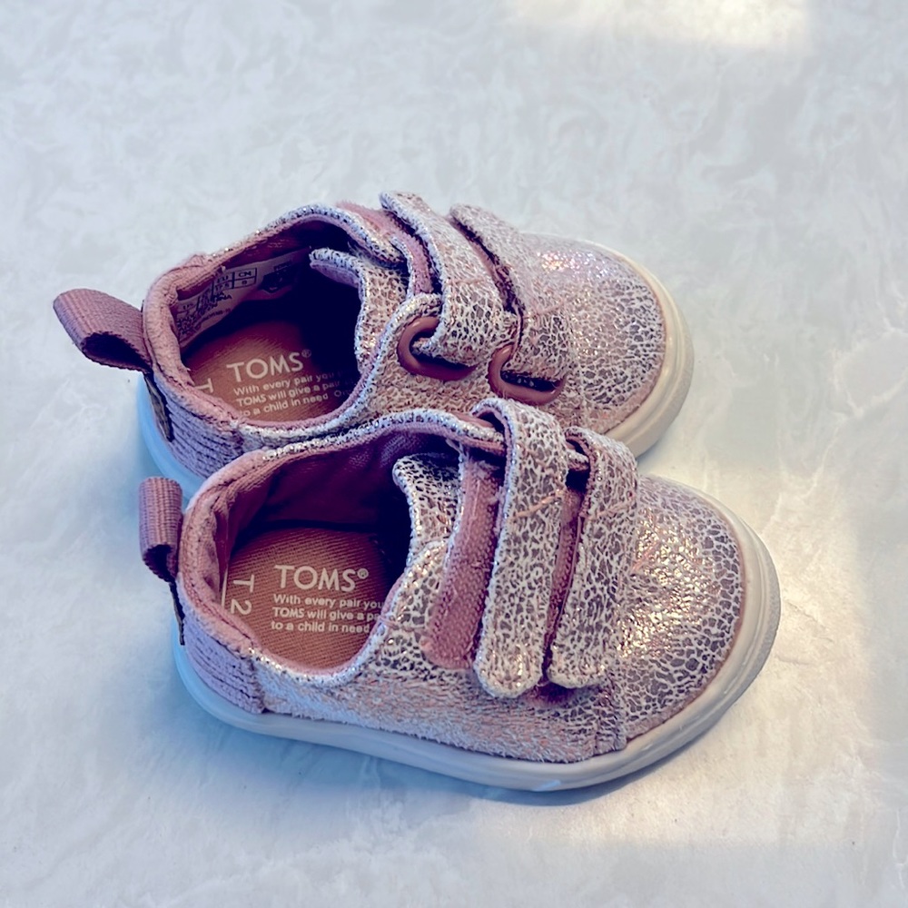 TOMS pink speckled baby shoes